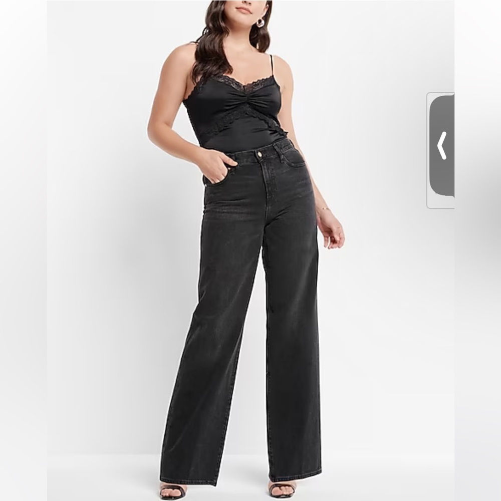 In like-new condition High Waisted Washed Black Wide Leg Jeans in size 4